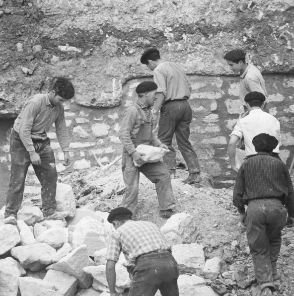 France 1963. Portuguese immigrant workers on a building site