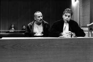 Go No Go, Les Frontières de l'Europe 1998-2002. Turkish immigrant with his lawyer at a court hearing concerning his residence permit. Amsterdam, Netherlands, 2001. Ad Van Denderen / Agence Vu'